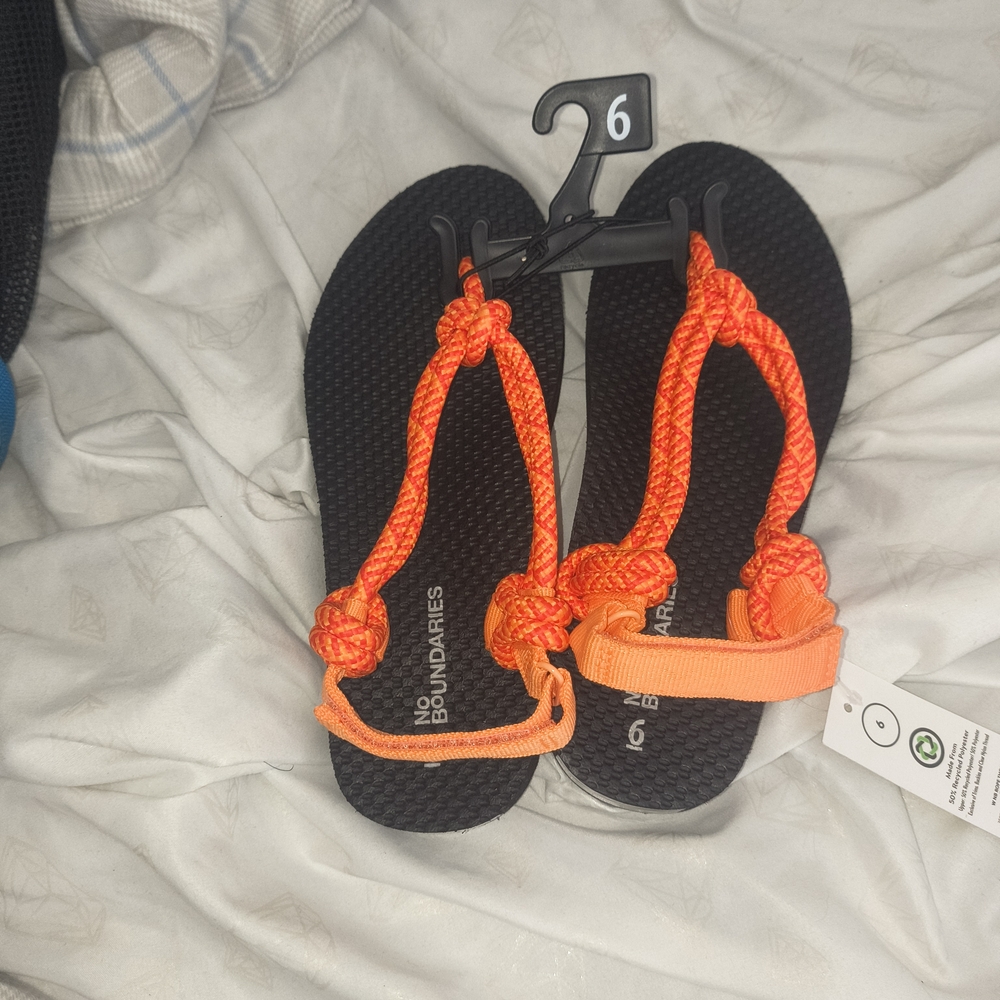 No Boundaries Black Sandals with Bright Orange Straps